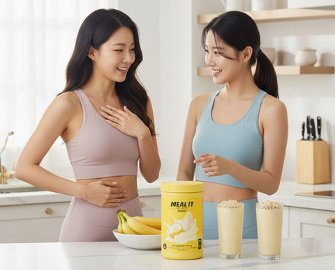 two girls about to drink meal it protein shake