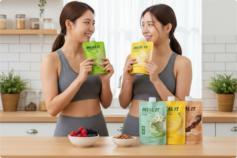 2 womans about to drink meal it protein shake after work out